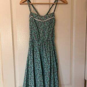 Maurice’s Floral Turquoise Dress with open back - Size Small